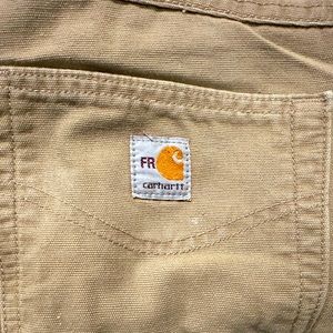 Fire resistant Carhartt loose fitting 34x30 khaki pants - two pair